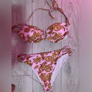 pink and gold women’s bikini